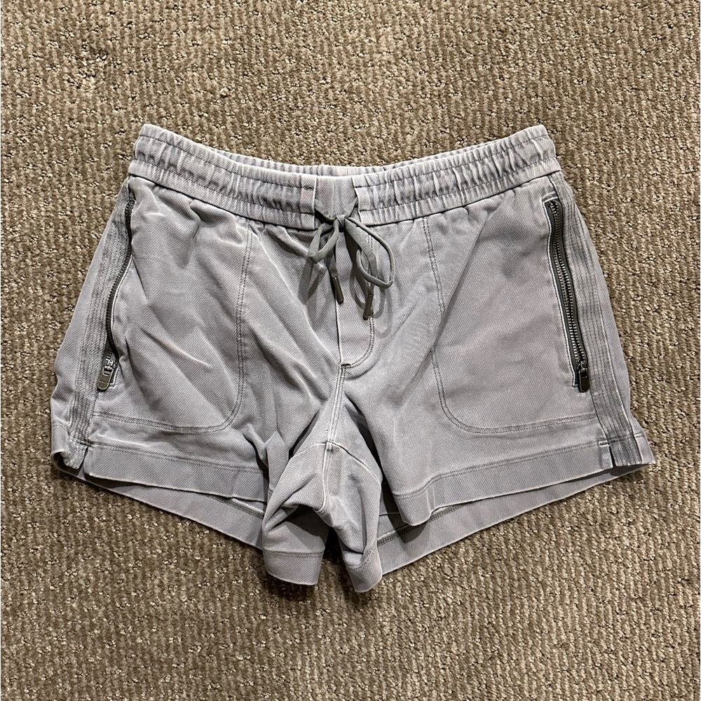Athleta army green shirts with draw string and zip up pockets